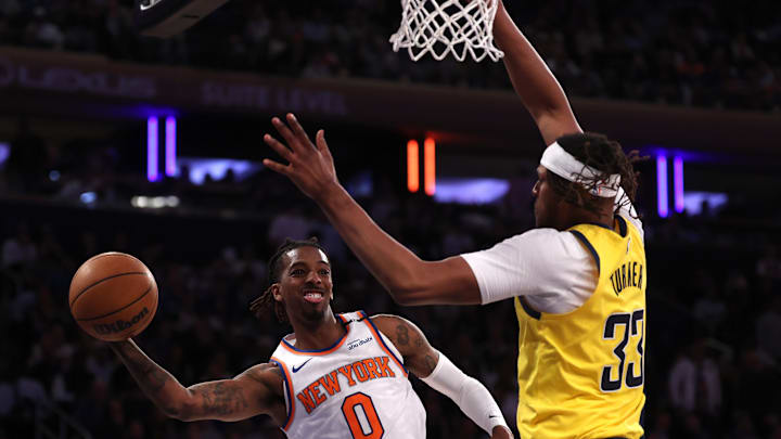 May 29, 2025; New York, New York, USA; New York Knicks guard Delon Wright (0) controls the ball against Indiana Pacers center Myles Turner (33) in the fourth quarter during game five of the eastern conference finals for the 2025 NBA Playoffs at Madison Square Garden. Mandatory Credit: Vincent Carchietta-Imagn Images