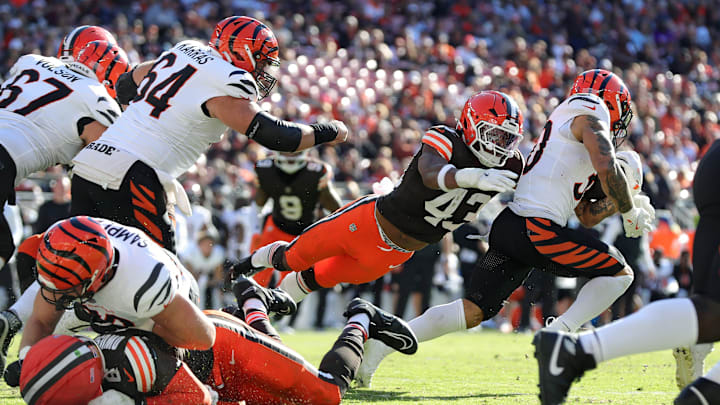 Cleveland Browns linebacker Mohamoud Diabate (43) makes a diving attempt for Cincinnati Bengals running back Chase Brown (30) during the second half of an NFL football game at Huntington Bank Field, Sunday, Oct. 20, 2024, in Cleveland, Ohio.