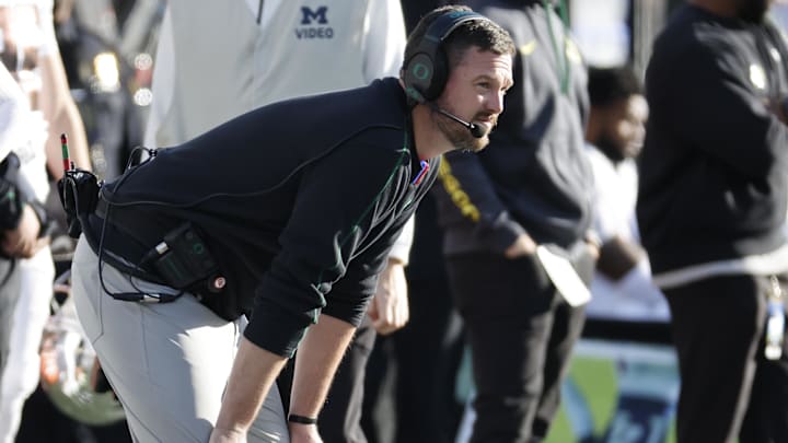Nov 2, 2024; Ann Arbor, Michigan, USA;  Oregon Ducks head coach on the sideline in the first half against the Michigan Wolverines at Michigan Stadium. Mandatory Credit: Rick Osentoski-Imagn Images