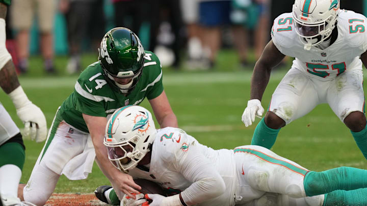Miami Dolphins linebacker Bradley Chubb (2) recovers a fumble after knocking the ball loose from New York Jets quarterback Trevor Siemian (14) during the second half of an NFL game at Hard Rock Stadium in Miami Gardens, Dec. 17, 2023. Miami Dolphins linebacker Bradley Chubb (2) recovers a fumble after knocking the ball loose from New York Jets quarterback Trevor Siemian (14) during the second half of an NFL game at Hard Rock Stadium in Miami Gardens, Dec. 17, 2023.
