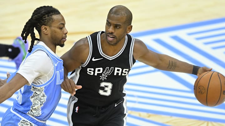 Mar 27, 2025; Cleveland, Ohio, USA; San Antonio Spurs guard Chris Paul (3) dribbles beside Cleveland Cavaliers guard Darius Garland (10) in the fourth quarter at Rocket Arena. Mandatory Credit: David Richard-Imagn Images