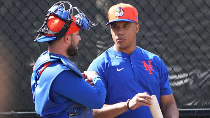 Feb 16, 2025; Port St. Lucie, FL, USA; New York Mets outfielder Juan Soto, right, talks with catcher Luis Torrens (13) during spring training. Mandatory Credit: Jim Rassol-Imagn Images