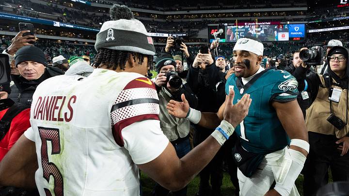 Nov 14, 2024; Philadelphia, Pennsylvania, USA; Philadelphia Eagles quarterback Jalen Hurts (1) and Washington Commanders quarterback Jayden Daniels (5) shake hands after an Eagles victory at Lincoln Financial Field. Mandatory Credit: Bill Streicher-Imagn Images Nov 14, 2024; Philadelphia, Pennsylvania, USA; Philadelphia Eagles quarterback Jalen Hurts (1) and Washington Commanders quarterback Jayden Daniels (5) shake hands after an Eagles victory at Lincoln Financial Field. Mandatory Credit: Bill Streicher-Imagn Images