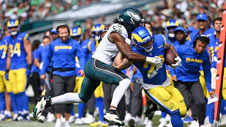 Sep 21, 2025; Philadelphia, Pennsylvania, USA; Los Angeles Rams running back Blake Corum (22) is tackled by Philadelphia Eagles cornerback Adoree' Jackson (8) at Lincoln Financial Field. Mandatory Credit: Eric Hartline-Imagn Images Sep 21, 2025; Philadelphia, Pennsylvania, USA; Los Angeles Rams running back Blake Corum (22) is tackled by Philadelphia Eagles cornerback Adoree' Jackson (8) at Lincoln Financial Field. Mandatory Credit: Eric Hartline-Imagn Images
