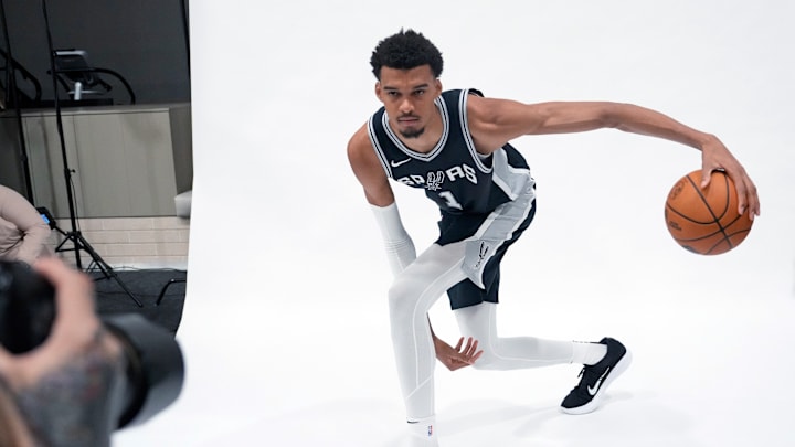 Sep 30, 2024; San Antonio, TX, USA; San Antonio Spurs center Victor Wembanyama (1) poses for photos during Media day at Victory Capital Performance Center in San Antonio. Sep 30, 2024; San Antonio, TX, USA; San Antonio Spurs center Victor Wembanyama (1) poses for photos during Media day at Victory Capital Performance Center in San Antonio.