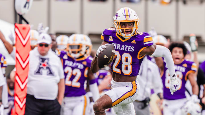 East Carolina CB Shavon Revel returns an interception.