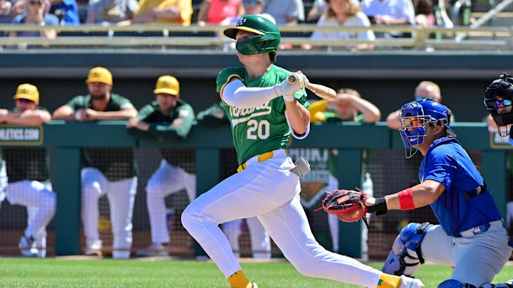 Mar 20, 2024; Mesa, Arizona, USA;  Oakland Athletics second baseman Zack Gelof (20) grounds out in