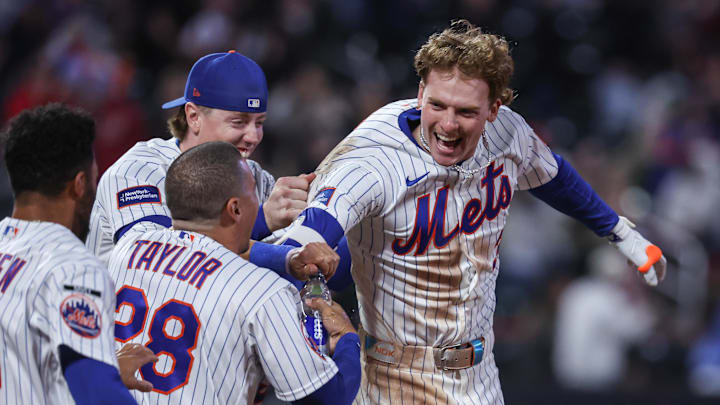 May 13, 2026; New York City, New York, USA;  New York Mets right fielder Carson Benge (3) celebrates with his teammates after hitting a game winning RBI single in the tenth inning against the Detroit Tigers at Citi Field. Mandatory Credit: Wendell Cruz-Imagn Images
