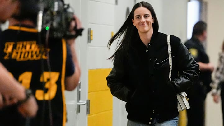 Caitlin Clark enters the arena before the Iowa women’s basketball game against USC and her jersey retirement.