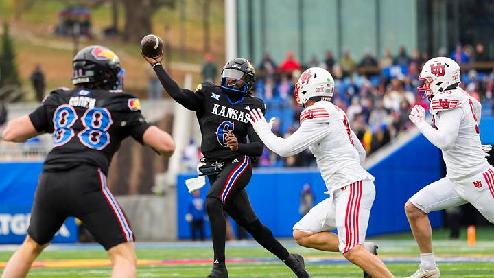 Nov 28, 2025; Lawrence, Kansas, USA; Kansas Jayhawks quarterback Jalon Daniels (6) throws a pass during the second half against the Utah Utes at David Booth Kansas Memorial Stadium. Mandatory Credit: Jay Biggerstaff-Imagn Images Nov 28, 2025; Lawrence, Kansas, USA; Kansas Jayhawks quarterback Jalon Daniels (6) throws a pass during the second half against the Utah Utes at David Booth Kansas Memorial Stadium. Mandatory Credit: Jay Biggerstaff-Imagn Images