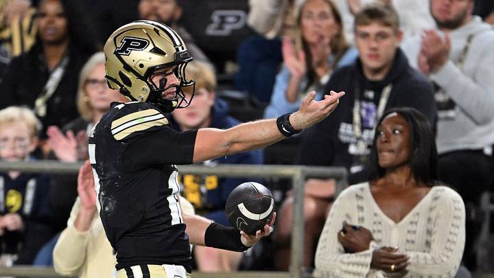 Oct 10, 2026; West Lafayette, Indiana, USA;  Purdue Boilermakers quarterback Ryan Browne (15) motions after getting a first down during the second quarter against the Minnesota Golden Gophers at Ross-Ade Stadium.  Mandatory Credit: Marc Lebryk-Imagn Images