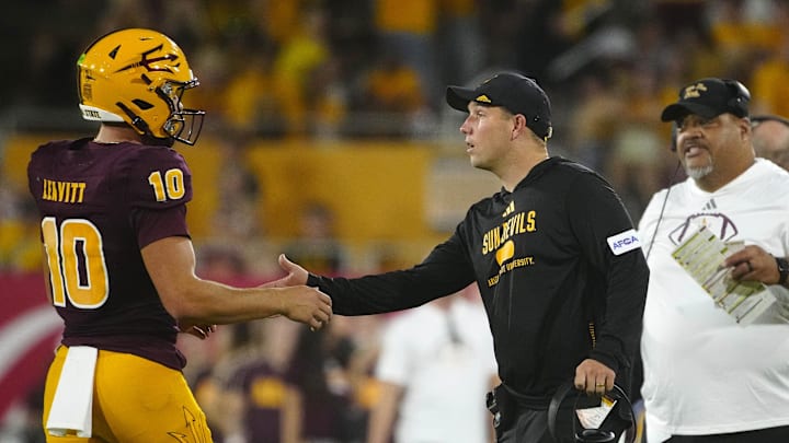 ASU head coach Kenny Dillingham greets quarterback Sam Leavitt (10) during a game against Wyoming at Sun Devil Stadium in Tempe on Aug. 31, 2024.