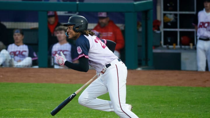 Rochester’s James Wood gets out of the box after an infield single.