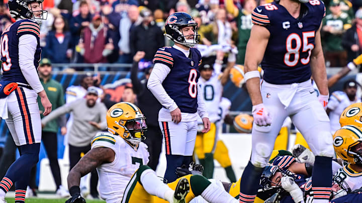 In the background, Jordan Love celebrates Karl Brooks' game-saving blocked field goal at Chicago last year.