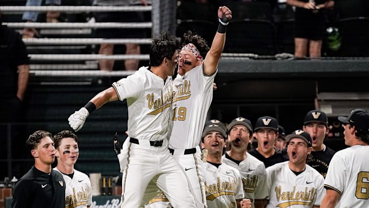 Vanderbilt second baseman Mike Mancini (5) celebrates his home run against Louisville with center fielder Rustan Rigdon (19) during the seventh inning at Hawkins Field in Nashville, Tenn., Tuesday, May 5, 2026.