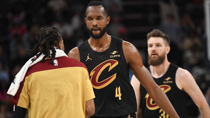 Mar 14, 2025; Memphis, Tennessee, USA; Cleveland Cavaliers power forward Evan Mobley (4) celebrates with teammates after making a three-pointer in the 1st quarter of the Cleveland Cavaliers vs. Memphis Grizzlies at FedExForum. Mandatory Credit: Matthew Smith-Imagn Images