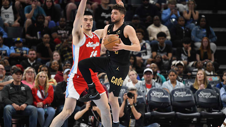 Mar 14, 2025; Memphis, Tennessee, USA; Cleveland Cavaliers shooting guard Ty Jerome (2) jumps and looks for open teammate in the 2nd quarter of the Cleveland Cavaliers vs. Memphis Grizzlies game at FedExForum. Mandatory Credit: Matthew Smith-Imagn Images