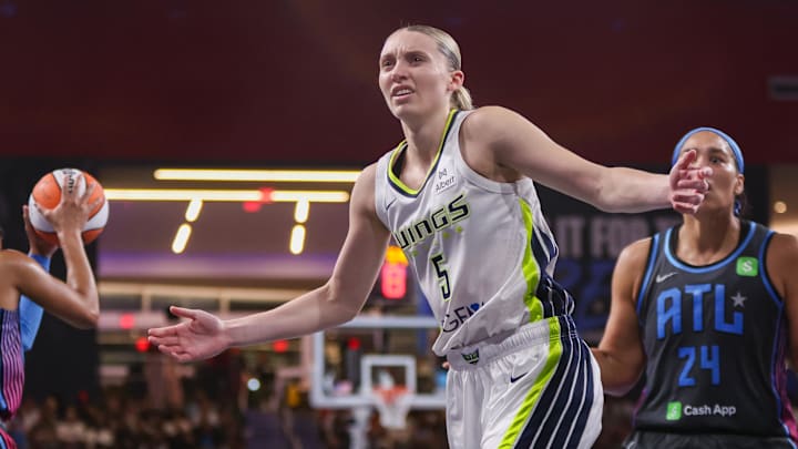 Aug 29, 2025; College Park, Georgia, USA; Dallas Wings guard Paige Bueckers (5) reacts after a play against the Atlanta Dream in the fourth quarter at Gateway Center Arena at College Park. Mandatory Credit: Brett Davis-Imagn Images