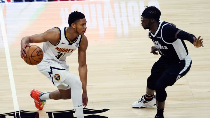 May 1, 2021; Los Angeles, California, USA; Denver Nuggets guard PJ Dozier (35) moves the ball against Los Angeles Clippers guard Reggie Jackson (1) during the first half at Staples Center. Mandatory Credit: Gary A. Vasquez-USA TODAY Sports May 1, 2021; Los Angeles, California, USA; Denver Nuggets guard PJ Dozier (35) moves the ball against Los Angeles Clippers guard Reggie Jackson (1) during the first half at Staples Center. Mandatory Credit: Gary A. Vasquez-USA TODAY Sports