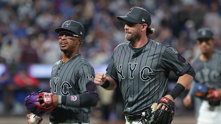 Apr 29, 2024; New York City, New York, USA; New York Mets shortstop Francisco Lindor (12) and second baseman Jeff McNeil (1) react after a double play to end the top of the seventh inning against the Chicago Cubs at Citi Field. Mandatory Credit: Vincent Carchietta-Imagn Images Apr 29, 2024; New York City, New York, USA; New York Mets shortstop Francisco Lindor (12) and second baseman Jeff McNeil (1) react after a double play to end the top of the seventh inning against the Chicago Cubs at Citi Field. Mandatory Credit: Vincent Carchietta-Imagn Images