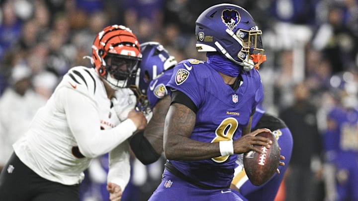 Baltimore Ravens quarterback Lamar Jackson (8) looks to throw from the pocket during the first quarter against the Cincinnati Bengals at M&T Bank Stadium. Baltimore Ravens quarterback Lamar Jackson (8) looks to throw from the pocket during the first quarter against the Cincinnati Bengals at M&T Bank Stadium.