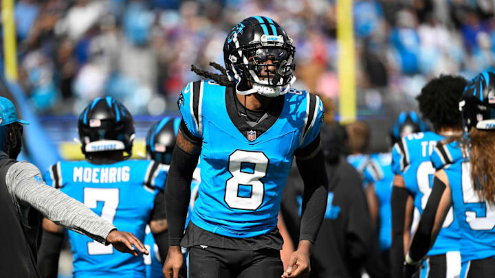 Oct 26, 2025; Charlotte, North Carolina, USA; Carolina Panthers cornerback Jaycee Horn (8) runs on to the field before the game at Bank of America Stadium. 