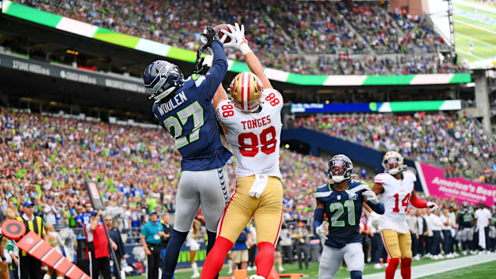 Sep 7, 2025; Seattle, Washington, USA; San Francisco 49ers tight end Jake Tonges (88) catches the ball for a touchdown being defended by Seattle Seahawks cornerback Riq Woolen (27) during the second half at Lumen Field. 