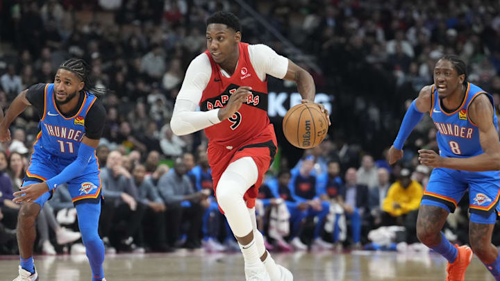 Dec 5, 2024; Toronto, Ontario, CAN; Toronto Raptors guard RJ Barrett (9)drives to the net against the Oklahoma City Thunder during the first half at Scotiabank Arena. Mandatory Credit: John E. Sokolowski-Imagn Images