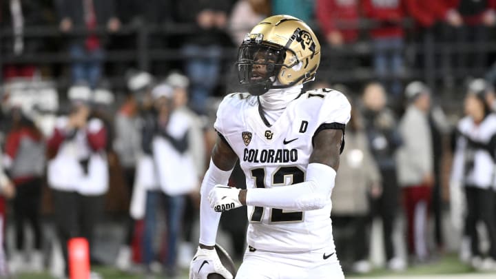 Nov 17, 2023; Pullman, Washington, USA; Colorado Buffaloes cornerback Travis Hunter (12) celebrates a touchdown against the Washington State Cougars in the first half at Gesa Field at Martin Stadium. Mandatory Credit: James Snook-USA TODAY Sports Nov 17, 2023; Pullman, Washington, USA; Colorado Buffaloes cornerback Travis Hunter (12) celebrates a touchdown against the Washington State Cougars in the first half at Gesa Field at Martin Stadium. Mandatory Credit: James Snook-USA TODAY Sports