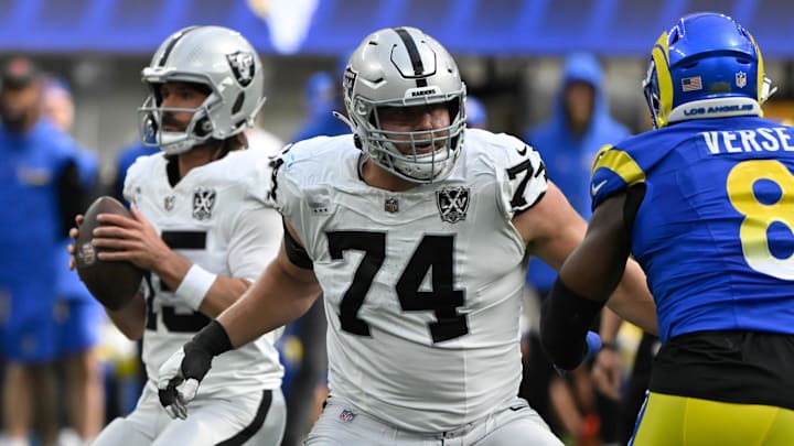 Oct 20, 2024; Inglewood, California, USA; Las Vegas Raiders offensive tackle Kolton Miller (74) provides protection for quarterback Gardner Minshew (15) during an NFL game against the Los Angeles Rams at SoFi Stadium. Mandatory Credit: Robert Hanashiro-Imagn Images