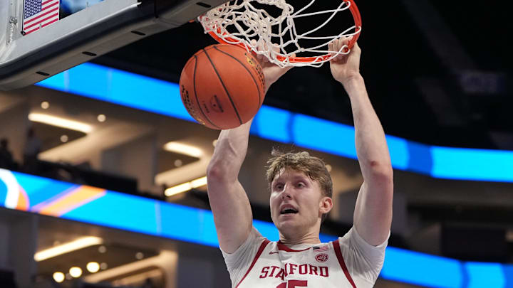 Mar 10, 2026; Charlotte, NC, USA; Stanford Cardinal forward Oskar Giltay (15) scores in the second half at Spectrum Center. Mandatory Credit: Bob Donnan-Imagn Images