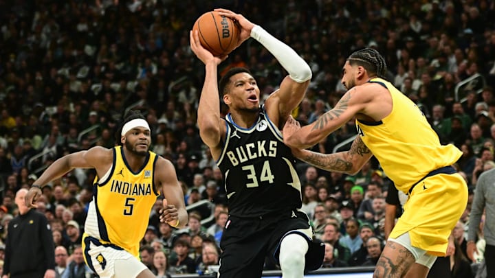 Apr 27, 2025; Milwaukee, Wisconsin, USA; Milwaukee Bucks forward Giannis Antetokounmpo (34) takes a shot against Indiana Pacers forward Obi Toppin (1) and forward Jarace Walker (5) in the third quarter during game four of first round for the 2024 NBA Playoffs at Fiserv Forum. Mandatory Credit: Benny Sieu-Imagn Images Apr 27, 2025; Milwaukee, Wisconsin, USA; Milwaukee Bucks forward Giannis Antetokounmpo (34) takes a shot against Indiana Pacers forward Obi Toppin (1) and forward Jarace Walker (5) in the third quarter during game four of first round for the 2024 NBA Playoffs at Fiserv Forum. Mandatory Credit: Benny Sieu-Imagn Images