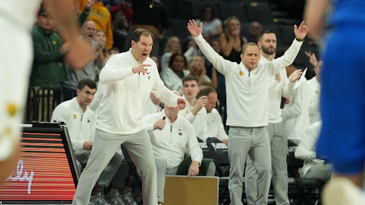 Nov 24, 2025; Las Vegas, Nevada, USA; Baylor Bears head coach Scott Drew reacts on the bench against the Creighton Bluejays during the first half in a 2025 Players Era Festival group play game at Michelob Ultra Arena.
