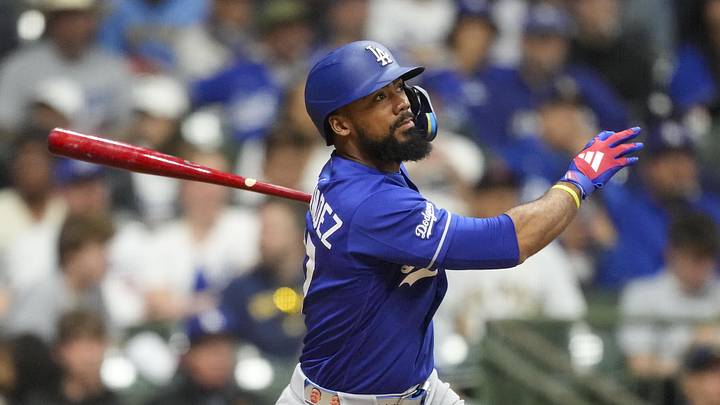 May 23, 2026; Milwaukee, Wisconsin, USA; Los Angeles Dodgers left fielder Teoscar Hernandez (37) hits an RBI single during the ninth inning against the Milwaukee Brewers at American Family Field. Mandatory Credit: Jeff Hanisch-Imagn Images May 23, 2026; Milwaukee, Wisconsin, USA; Los Angeles Dodgers left fielder Teoscar Hernandez (37) hits an RBI single during the ninth inning against the Milwaukee Brewers at American Family Field. Mandatory Credit: Jeff Hanisch-Imagn Images