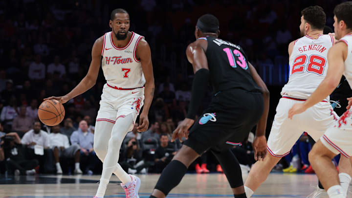 Feb 28, 2026; Miami, Florida, USA; Houston Rockets forward Kevin Durant (7) dribbles the basketball against Miami Heat center Bam Adebayo (13) during the first quarter at Kaseya Center. Mandatory Credit: Sam Navarro-Imagn Images
