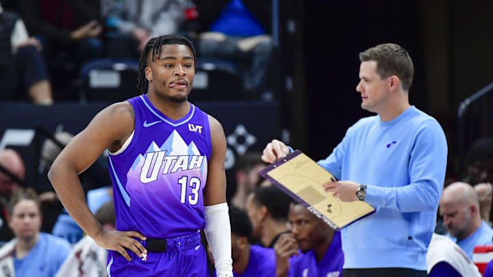Nov 27, 2024; Salt Lake City, Utah, USA; Utah Jazz guard Isaiah Collier (13) talks with head coach Will Hardy during a timeout against the Denver Nuggets during the first half at the Delta Center. Mandatory Credit: Christopher Creveling-Imagn Images