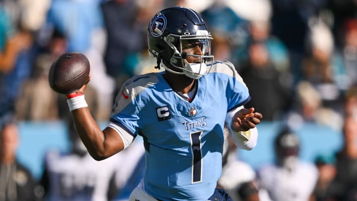 Nov 30, 2025; Nashville, Tennessee, USA; Tennessee Titans quarterback Cam Ward (1) throws downfield against the Jacksonville Jaguars during the first half at Nissan Stadium. Mandatory Credit: Steve Roberts-Imagn Images