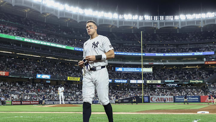 Jun 4, 2025; Bronx, New York, USA;  New York Yankees right fielder Aaron Judge (99) prepares to take the field after be stranded on base in the sixth inning against the Cleveland Guardians at Yankee Stadium. Mandatory Credit: Wendell Cruz-Imagn Images