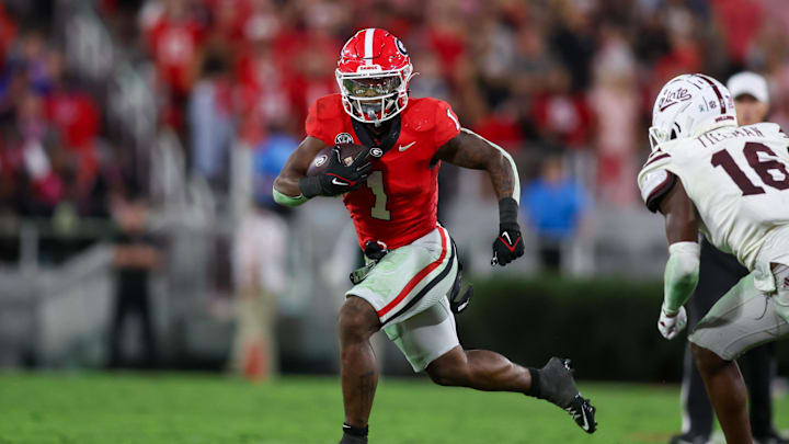 Oct 12, 2024; Athens, Georgia, USA; Georgia Bulldogs running back Trevor Etienne (1) runs the ball against the Mississippi State Bulldogs in the fourth quarter at Sanford Stadium. Mandatory Credit: Brett Davis-Imagn Images
