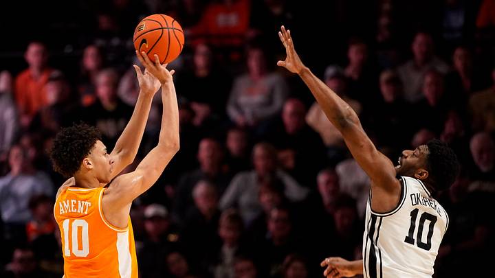 Tennessee forward Nate Ament (10) shoots for three over Vanderbilt forward Ak Okereke (10) during the second half at Memorial Gym in Nashville, Tenn., Saturday, Feb. 21, 2026. Tennessee forward Nate Ament (10) shoots for three over Vanderbilt forward Ak Okereke (10) during the second half at Memorial Gym in Nashville, Tenn., Saturday, Feb. 21, 2026.