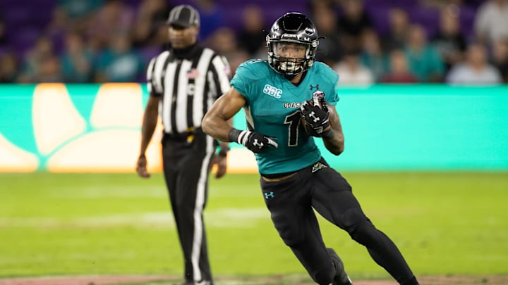 Dec 17, 2021; Orlando, Florida, USA; Coastal Carolina Chanticleers running back Braydon Bennett (1) runs with the ball during the first half against the Northern Illinois Huskies during the 2021 Cure Bowl at Exploria Stadium. Mandatory Credit: Matt Pendleton-Imagn Images