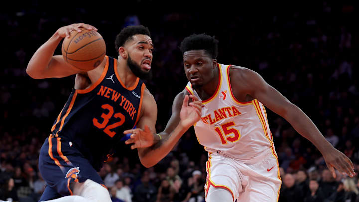 Dec 11, 2024; New York, New York, USA; New York Knicks center Karl-Anthony Towns (32) drives to the basket against Atlanta Hawks center Clint Capela (15) during the third quarter at Madison Square Garden. Mandatory Credit: Brad Penner-Imagn Images Dec 11, 2024; New York, New York, USA; New York Knicks center Karl-Anthony Towns (32) drives to the basket against Atlanta Hawks center Clint Capela (15) during the third quarter at Madison Square Garden. Mandatory Credit: Brad Penner-Imagn Images