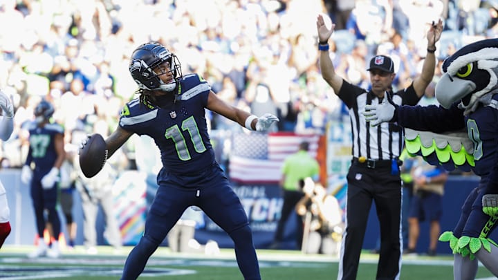 Oct 6, 2024; Seattle, Washington, USA; Seattle Seahawks wide receiver Jaxon Smith-Njigba (11) celebrates following a touchdown catch against the New York Giants during the fourth quarter at Lumen Field. Mandatory Credit: Joe Nicholson-Imagn Images