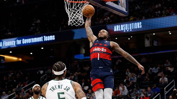 Dec 1, 2025; Washington, District of Columbia, USA; Washington Wizards forward Cam Whitmore (1) dunks the ball as Milwaukee Bucks guard Gary Trent Jr. (5) looks on in the second half at Capital One Arena. Mandatory Credit: Geoff Burke-Imagn Images Dec 1, 2025; Washington, District of Columbia, USA; Washington Wizards forward Cam Whitmore (1) dunks the ball as Milwaukee Bucks guard Gary Trent Jr. (5) looks on in the second half at Capital One Arena. Mandatory Credit: Geoff Burke-Imagn Images