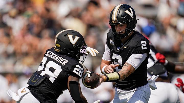 Vanderbilt quarterback Jared Curtis (2) hands off to running back Sedrick Alexander (28) during the first quarter against NC State at FirstBank Stadium in Nashville, Tenn., Saturday, Sept. 19, 2026.