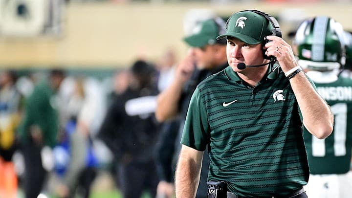 Sep 28, 2024; East Lansing, Michigan, USA; Michigan State Spartans head coach Jonathan Smith watches from the sidelines during the fourth quarter as the Ohio State Buckeyes defeat his team at Spartan Stadium. Mandatory Credit: Dale Young-Imagn Images