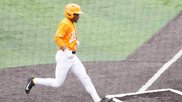 Tennessee infielder/outfielder Jay Abernathy (8) runs home safely at a Tennessee baseball game against Samford, in Lindsey Nelson Stadium at University of Tennessee in Knoxville, Tenn., Saturday, Feb. 22, 2025.