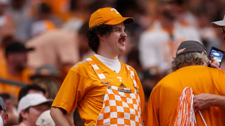 Aug 30, 2025; Atlanta, Georgia, USA; Tennessee Volunteers fan in the stands against the Syracuse Orange in the fourth quarter at Mercedes-Benz Stadium. Mandatory Credit: Brett Davis-Imagn Images
