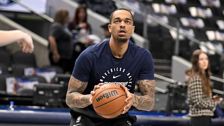 Mar 21, 2025; Dallas, Texas, USA; Dallas Mavericks forward P.J. Washington (25) warms up before the game between the Dallas Mavericks and the Detroit Pistons at the American Airlines Center. Mandatory Credit: Jerome Miron-Imagn Images