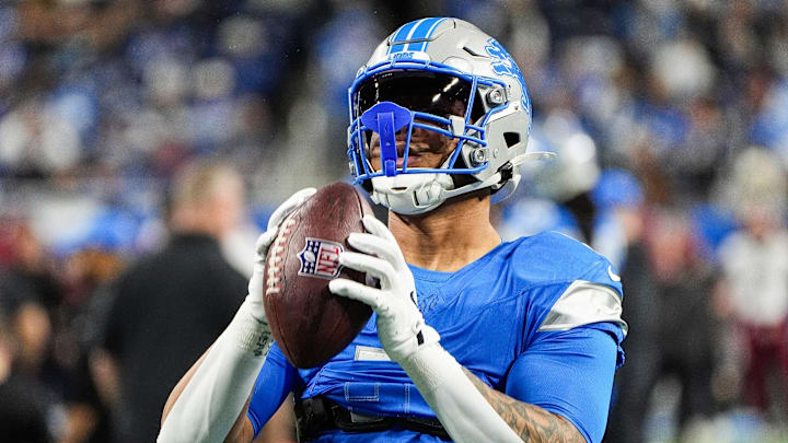 Detroit Lions running back David Montgomery (5) warms up before the NFC divisional round at Ford Field in Detroit on Saturday, Jan. 18, 2025.